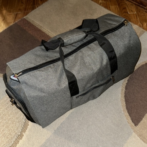 Garment bag that zips into a duffle bag - Picture 1 of 3